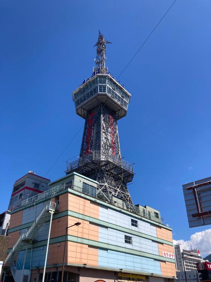 J-Hoppers Beppu Guesthouse ジェイホッパーズ別府ゲストハウス Eksteriør billede